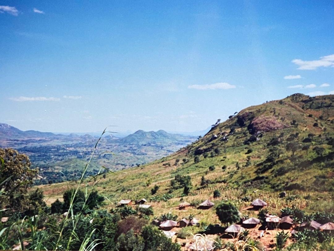 A village around the corner (or two or three) from our house on Zomba Plateau. In the distance, inselbergs.