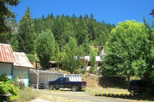 This view is of our house on left, my truck, and my father-in-law's house up on the hill next to us.