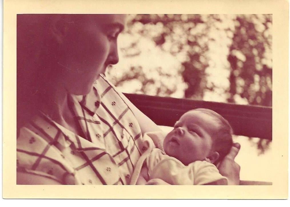 When Mom & I were discharged from St. Luke's, we couldn't go home to #24 as Dad was still painting, so we went to Myrtle Ma's house for a short time. This was taken on her porch - I was 7-10 days old, I think.