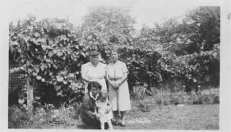 I am the toddler, with my mother Ethel White, grandmother Bertha Willoughby, and great-grandmother Philenia Gray. Summer1941, Fredonia, KS.
