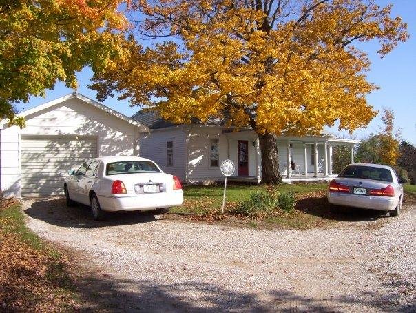 street view of house and garage.