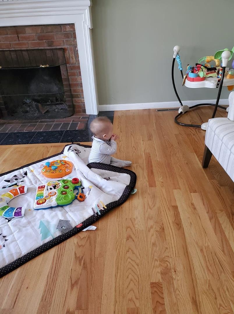 Lincoln sat up by himself. He had done it 5 minutes before as well but I was so excited I ran to get Jenn and forgot to take a picture. Was glad he did it a second time