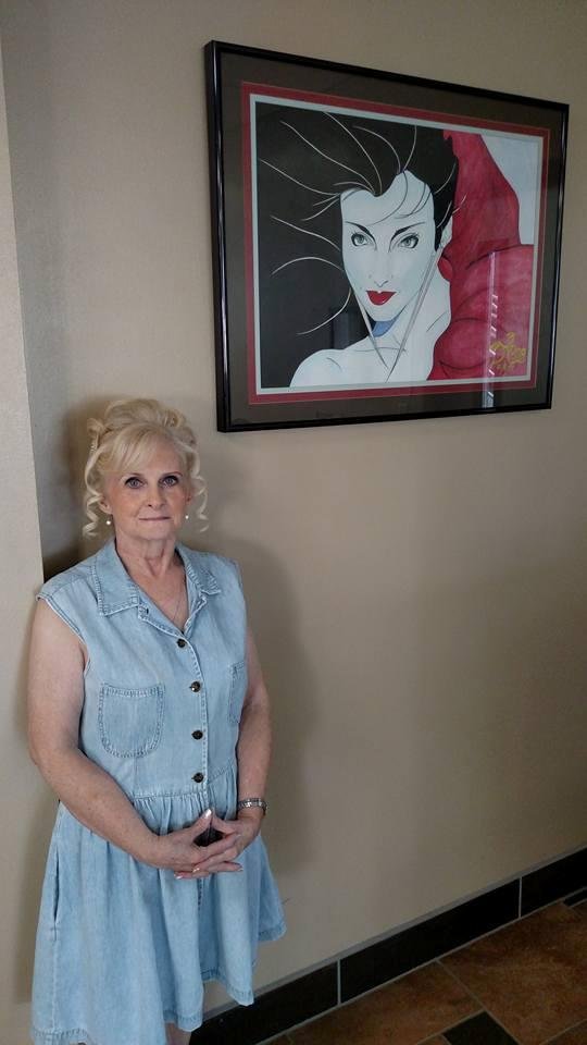The one Tellis Mcmillian wanted to take. The picture beside me was done by Kong Phannavong, who also happens to be a talented artist, Master Chef and can turn leather into the most beautiful bags ever and can bedazzle like 