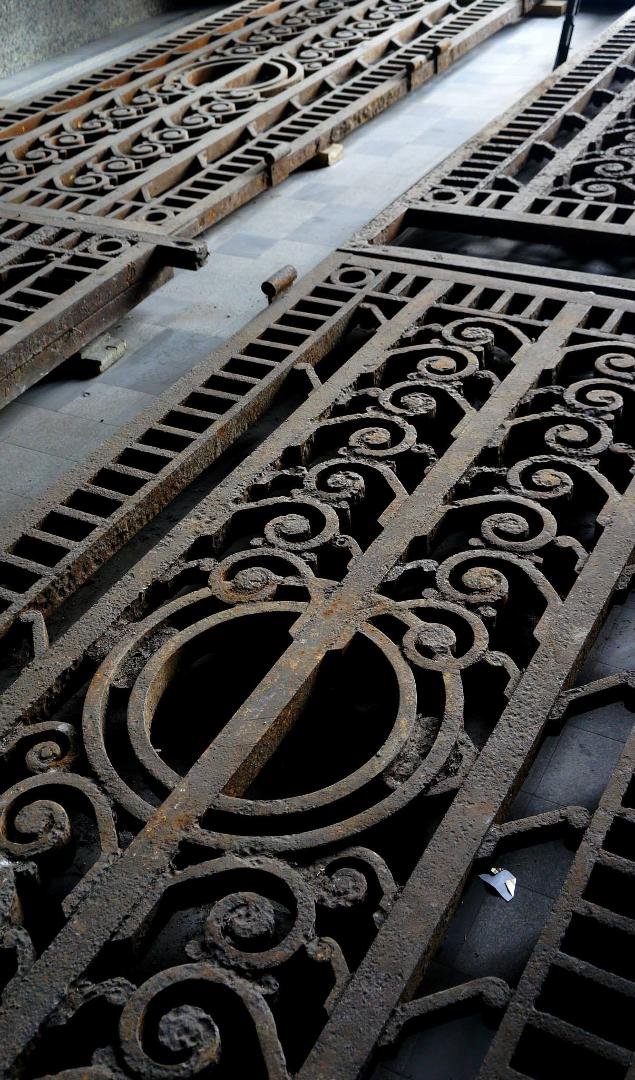 Doors on the floor, ready to be restored