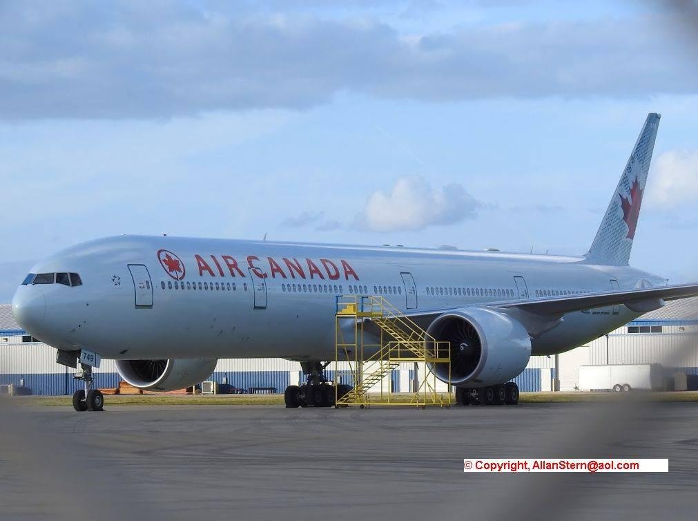 I stopped by at Melbourne Intl Airport (FL) again. This time I saw Air Canada's B-777 C-FKAU (#749) parked at the AeroMod International facility there. AeroMod does maintenance and modifications to Air Canada's fleet of B-7