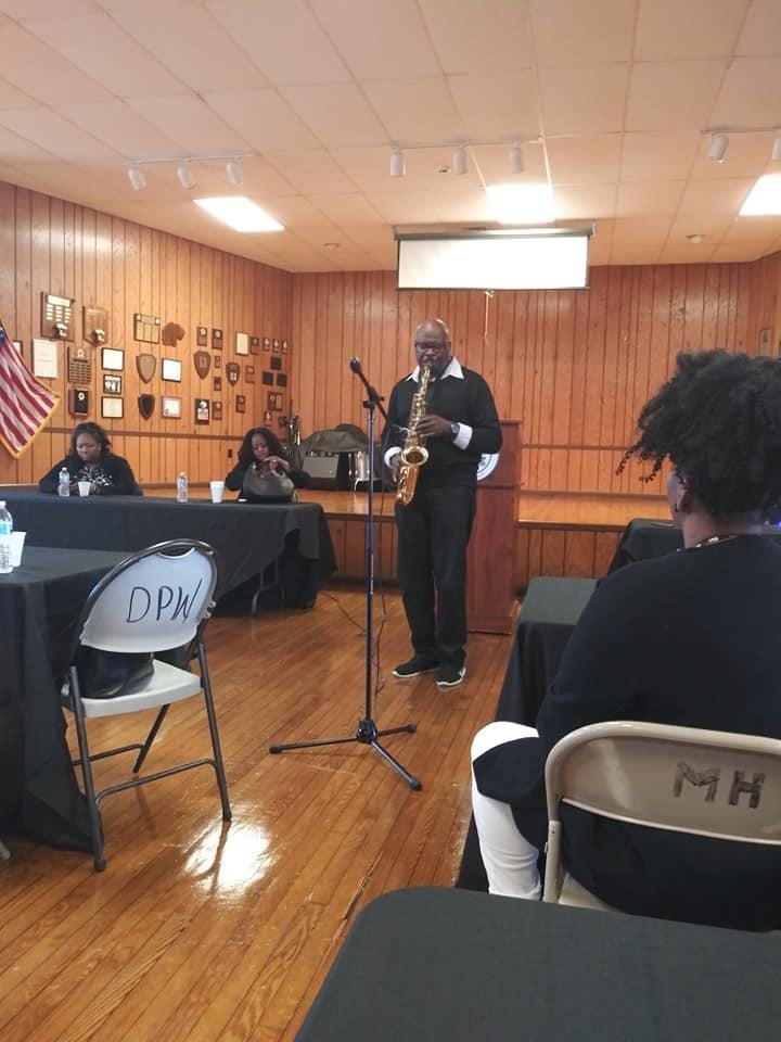 Community meeting at Malandra Hall.