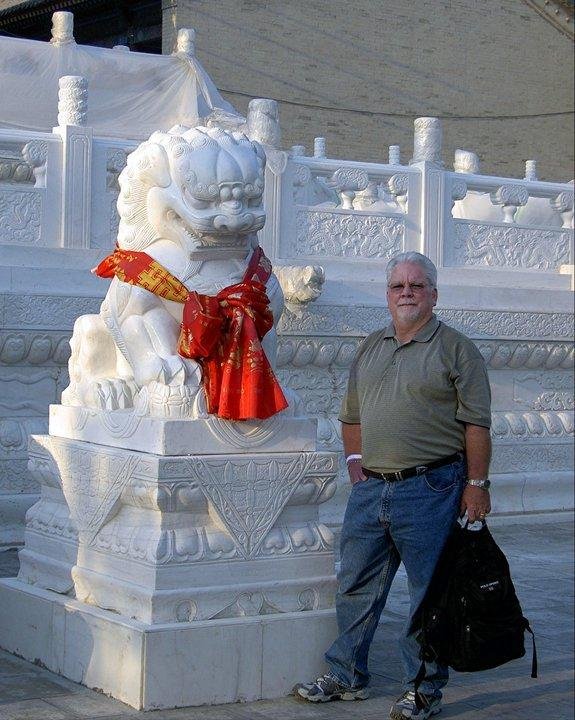 In Xi'An posing at one of the thousands of amazing sculptured marble stairways in China