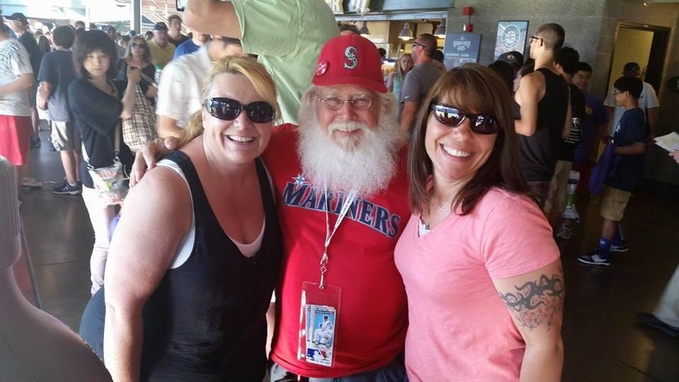 At the Mariners game with Cathy Sandy Lindelof and 2 others.