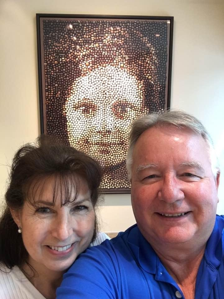 We visited Fran's chocolates in Seattle. The picture of Fran, behind us, is a mosaic made with chocolate's!