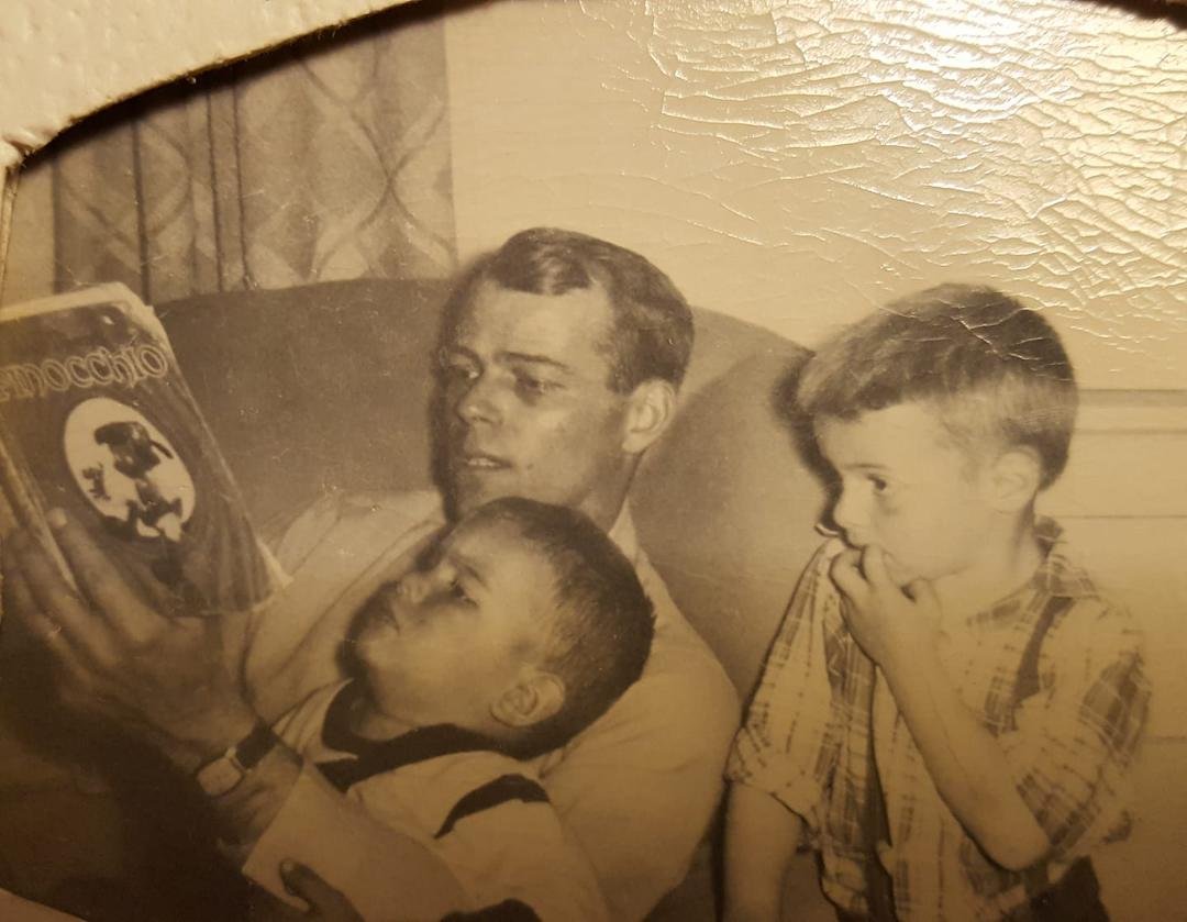 National siblings day...Dad reading Pinocchio to my brother Andy and me. We had a great time growing up.