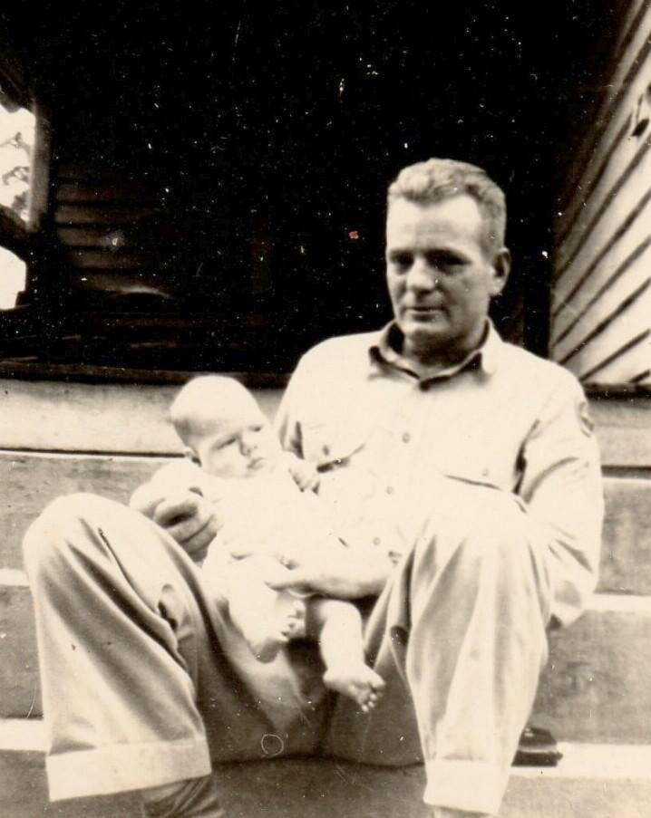 My father, Terry Lee Atchison, holding me the week he returned from WWII. Big Sandy, Tennessee.