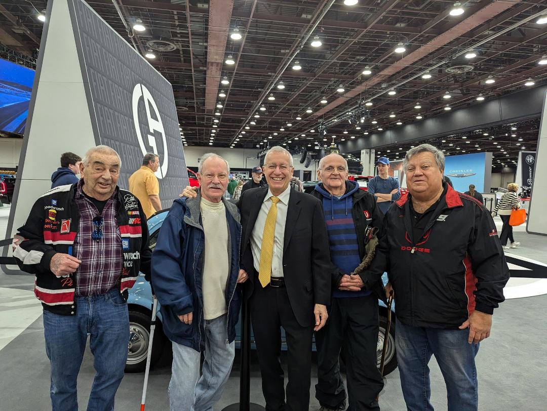 Posing with Vic Fedilli out of Doug Ford's cabinet, at the auto show