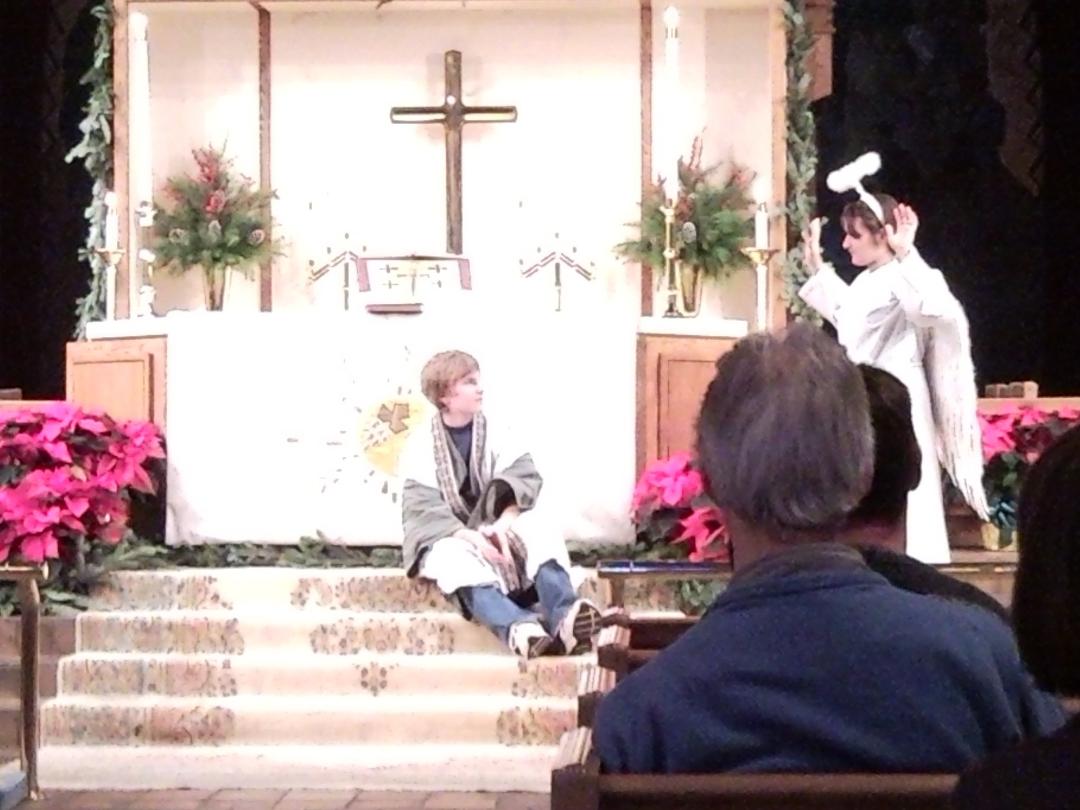 Abbey as the angel Gabriel appearing to Joseph in the Christmas Eve pageant.