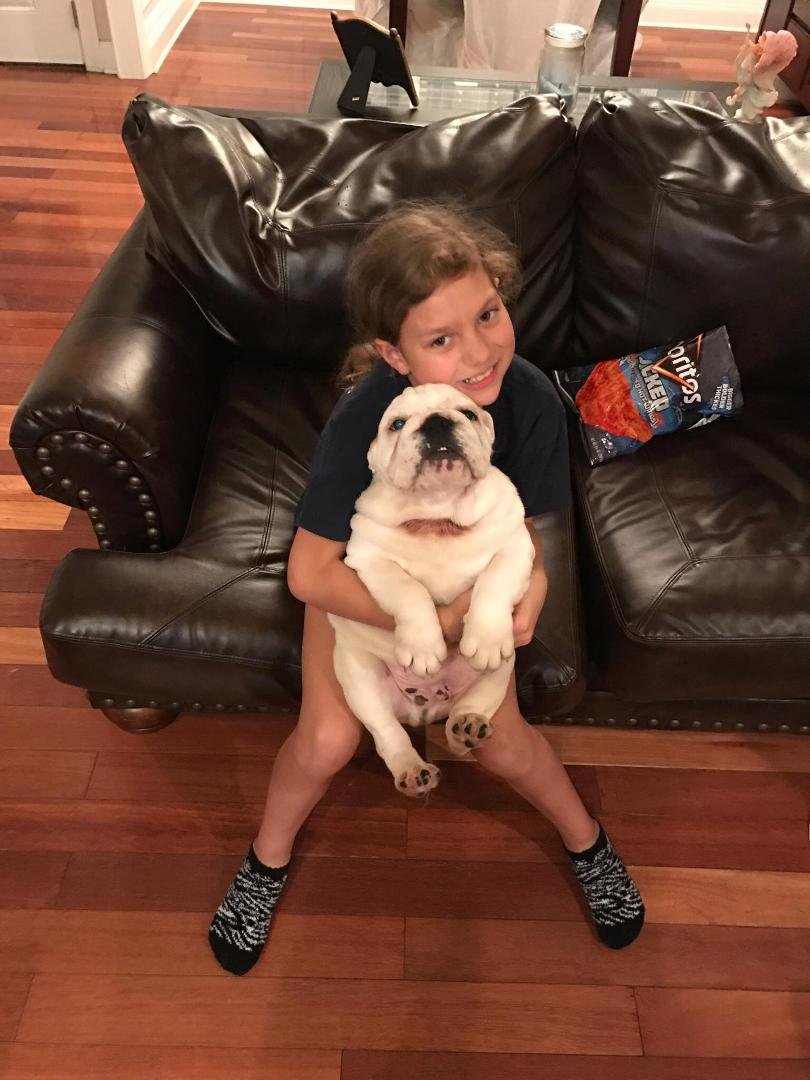 My granddaughter Chloe with her dog. Love her she's my CoCo.
