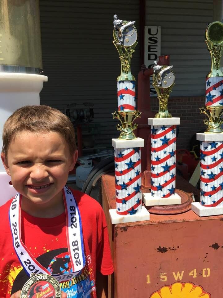 My Grandson Remington competed in the National Karate Championship today in Cincinnati taking three trophy’s and a gold metal . He works hard at  it and we’re proud of him .