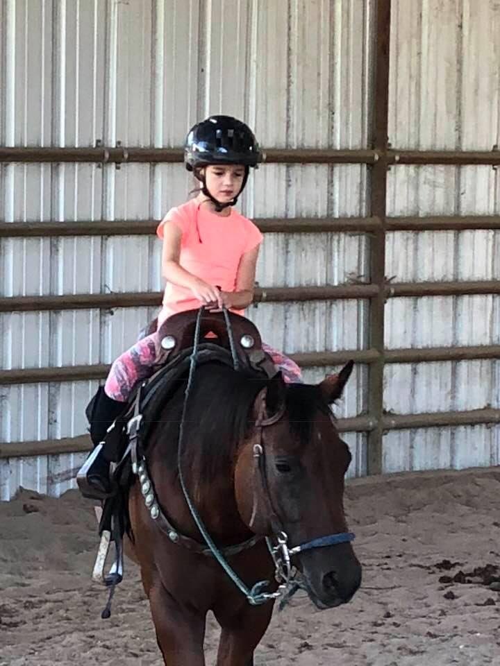 My granddaughter Bianca on Abby.