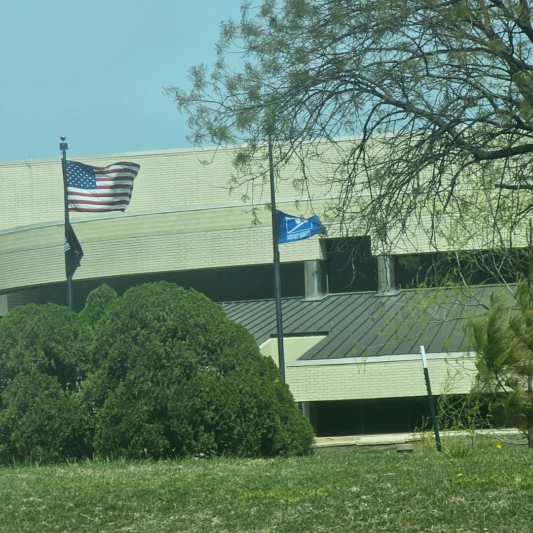 Any of my postal network know why pur flags halfway down?
