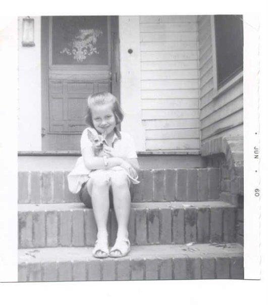 504 N. 9th Street - Lisa Baker and Poco, the pet Chihuahua, in a sweet pose