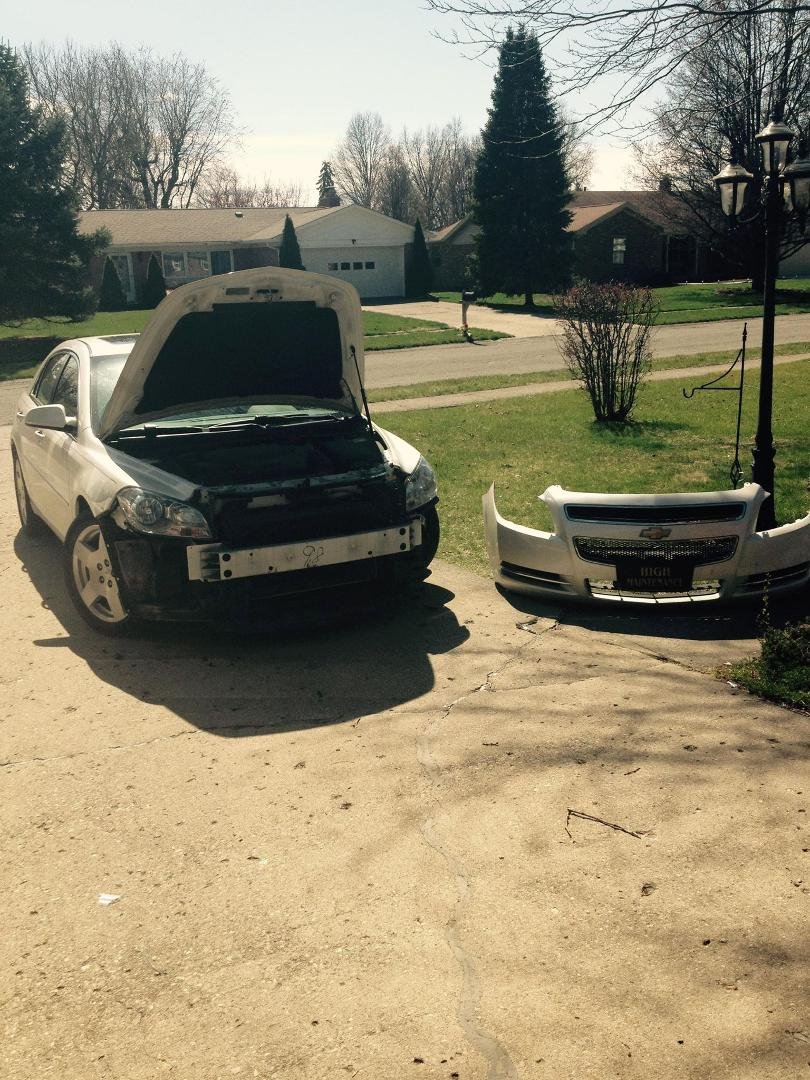This is how you have to change a head lamp on a 2010 Chevy Malibu. GM does not make it easy.