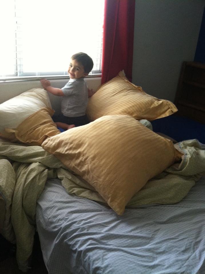 Having way too much fun with Tyson. We built a pillow castle on Gram's bed!  Lovin' this time