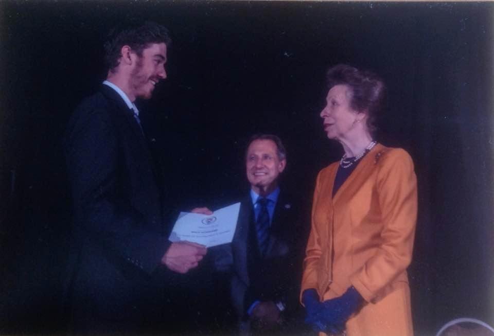 Princess Anne presenting Michael with his Gold Duke of Edinburgh award.