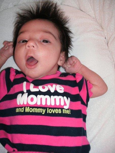 My grandaughter Noelle. Lookin for the nipple.