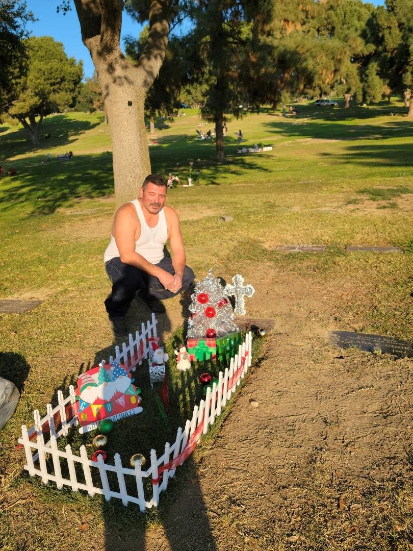 Went to decorate Mom Dad and brothers resting place had so much fun with my son and brother telling story's the story behind the silver tree and red balls is that was our tree every year growing up dad would pull it out ev