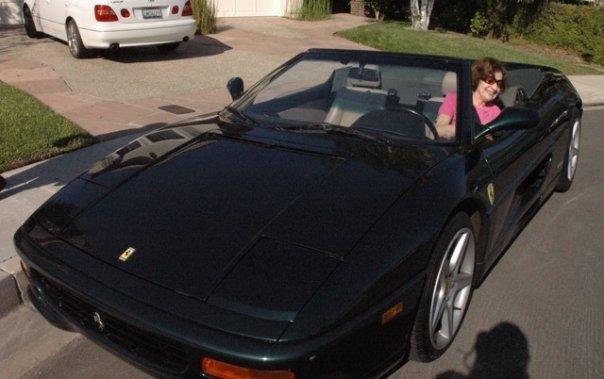 My mom and her Ferrari. Happy Happy Birthday!!82 years old and still rocks!!