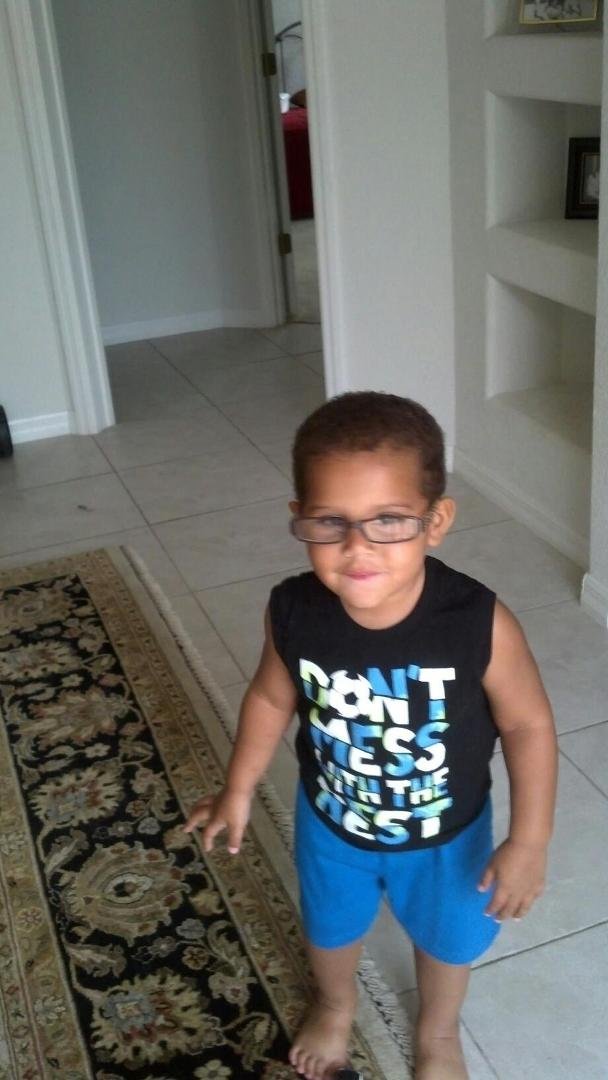 He loves his grandmother's glasses.