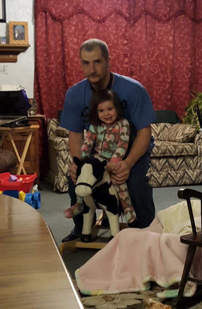 Daddy keeping Cheyenne entertained !!