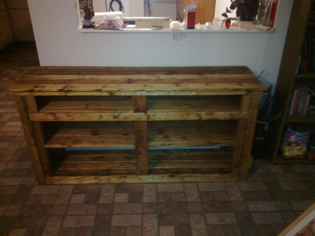 Just got first coat of stain on Julies new entertainment center.after 8 hours to build it