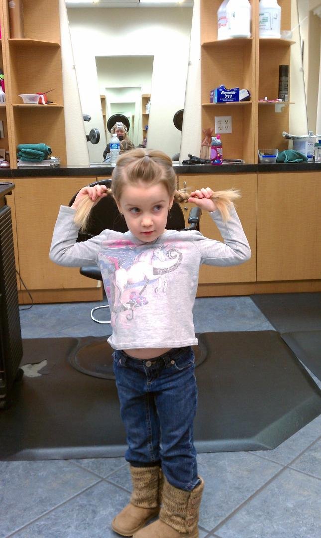 Kaylee at he salon: "look at my braids!"