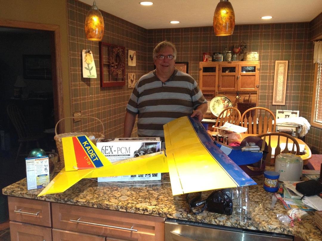 Today was my lucky day. We went to the Labor Day Omahawks R/C Airplane show in Omaha. I entered one ticket in the raffle. Well I won the grand prize. It is a Kadet LT-25 airplane, plus radio, and extra other parts and a yea