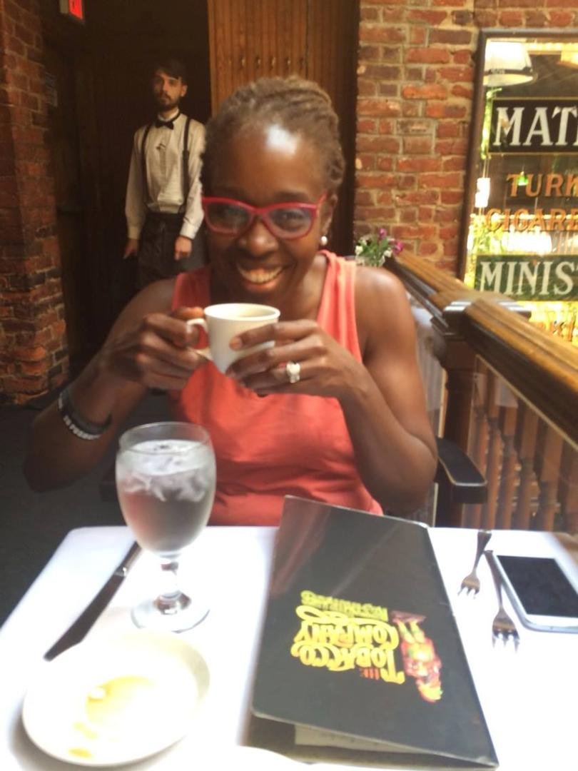 Jacque just put lemon in her coffee at the Tobacco Company in Richmond.