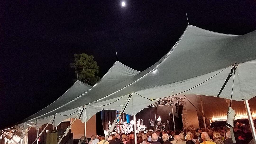 Enjoying the Drifters concert in Pawleys Island under "the pale moonlight" on a "blanket (bag chair) with my baby".