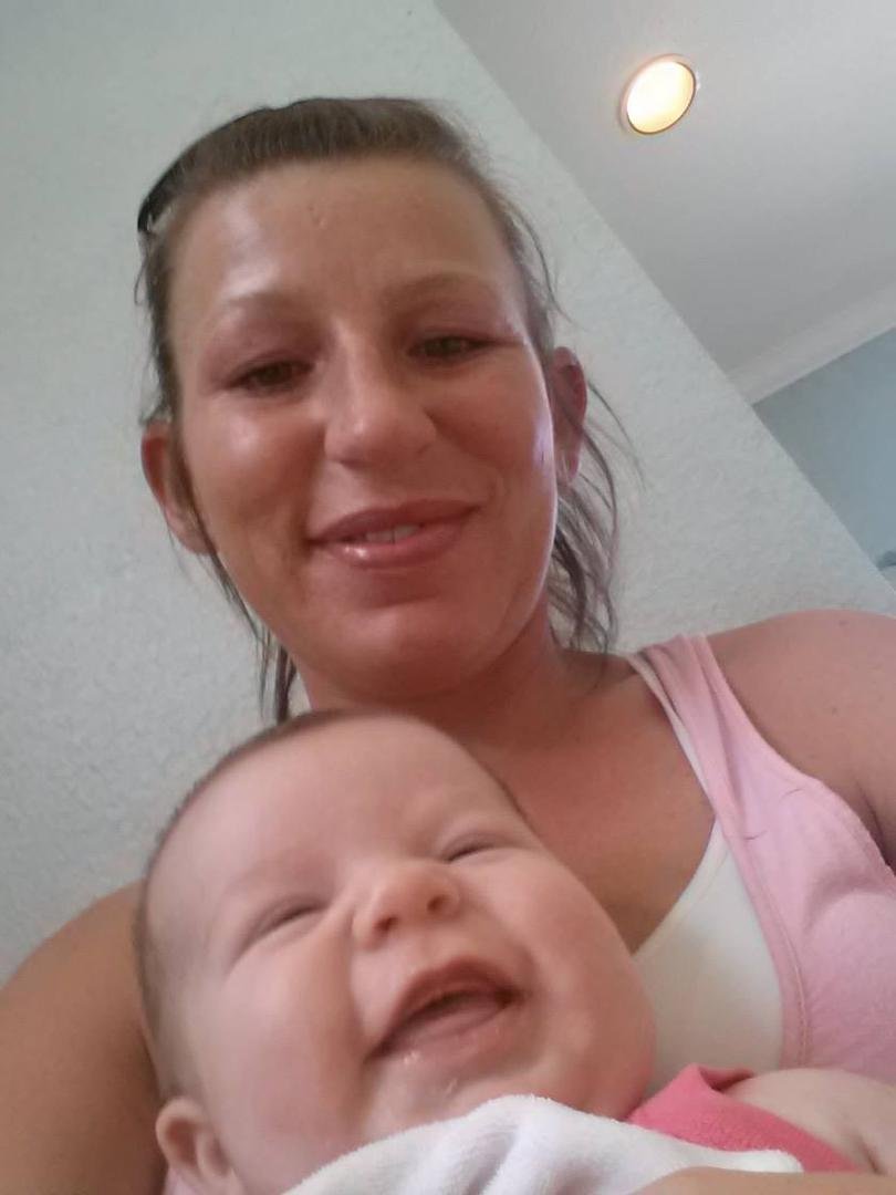 Happy sick baby! She is laughing at the other babies crying. .lol