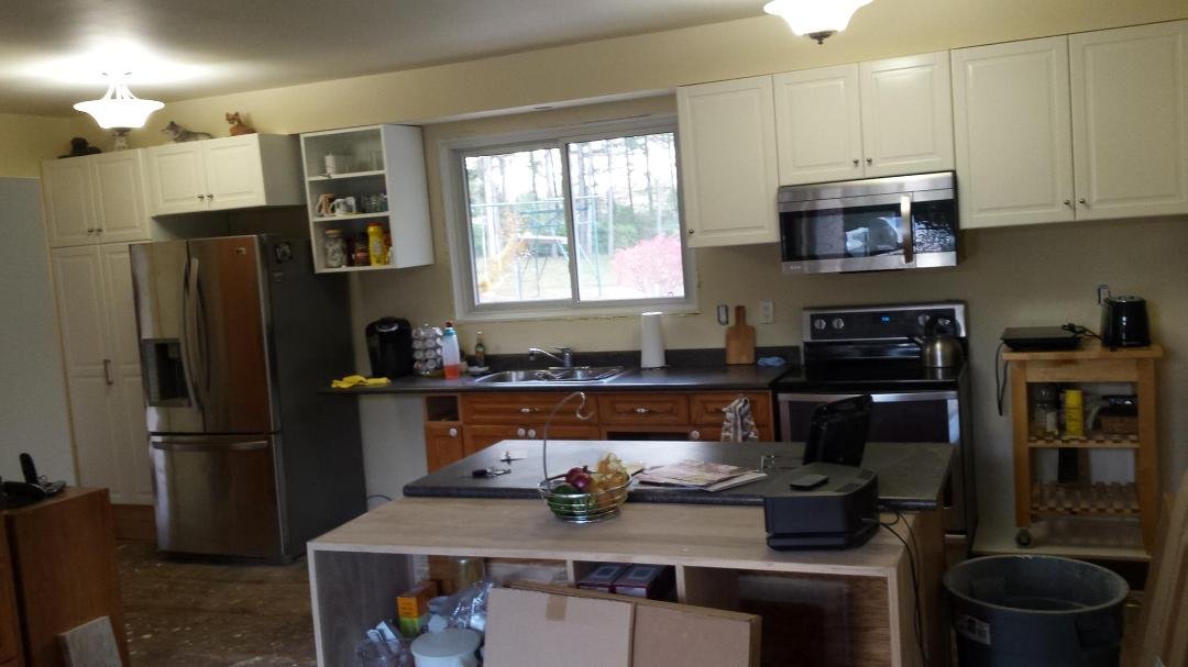 Slowly starting to resemble a kitchen again.