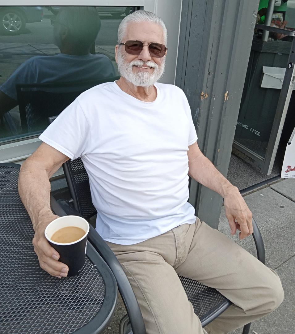 Randy with his yummy coffee at The Vault coffee house