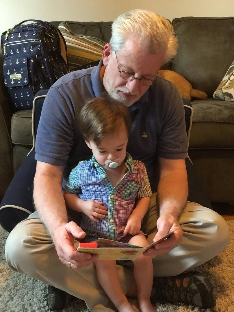 Session finished; reading to the Grandbaby...