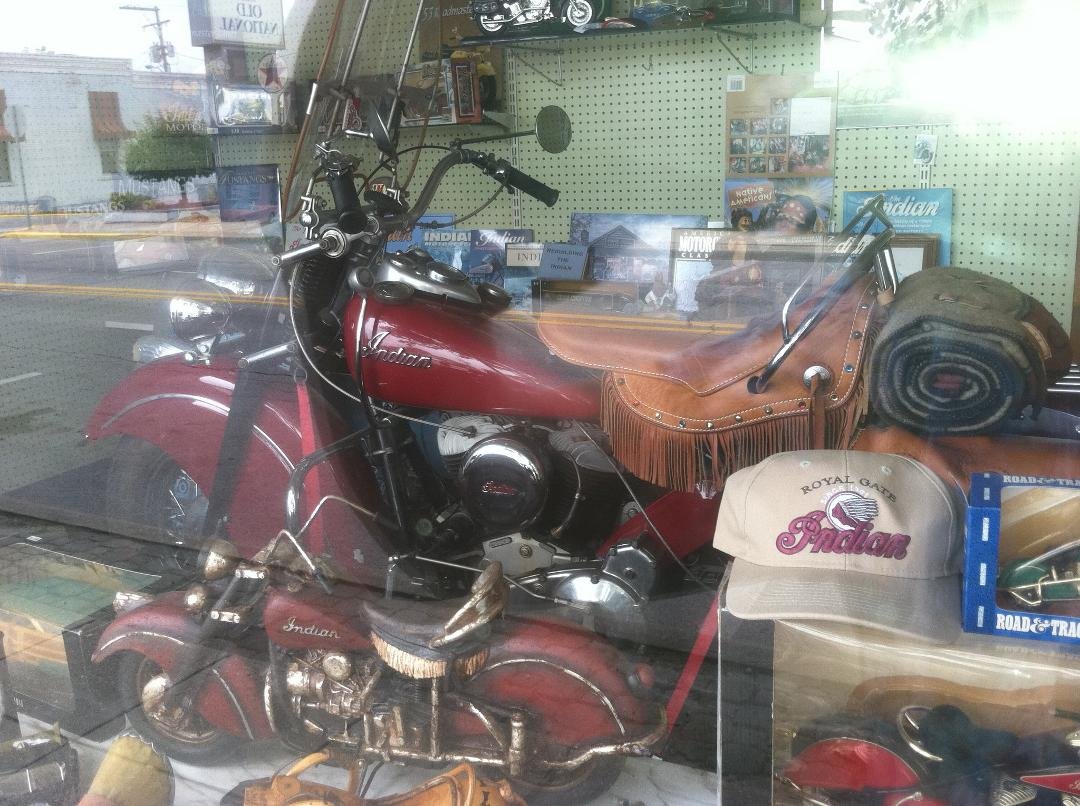Bike in window of shop in Greencastle IN. On town square