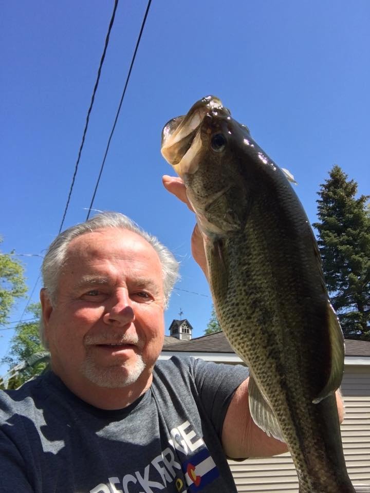 Nice 4 pound largemouth he's got to go back in season don't open till next Saturday