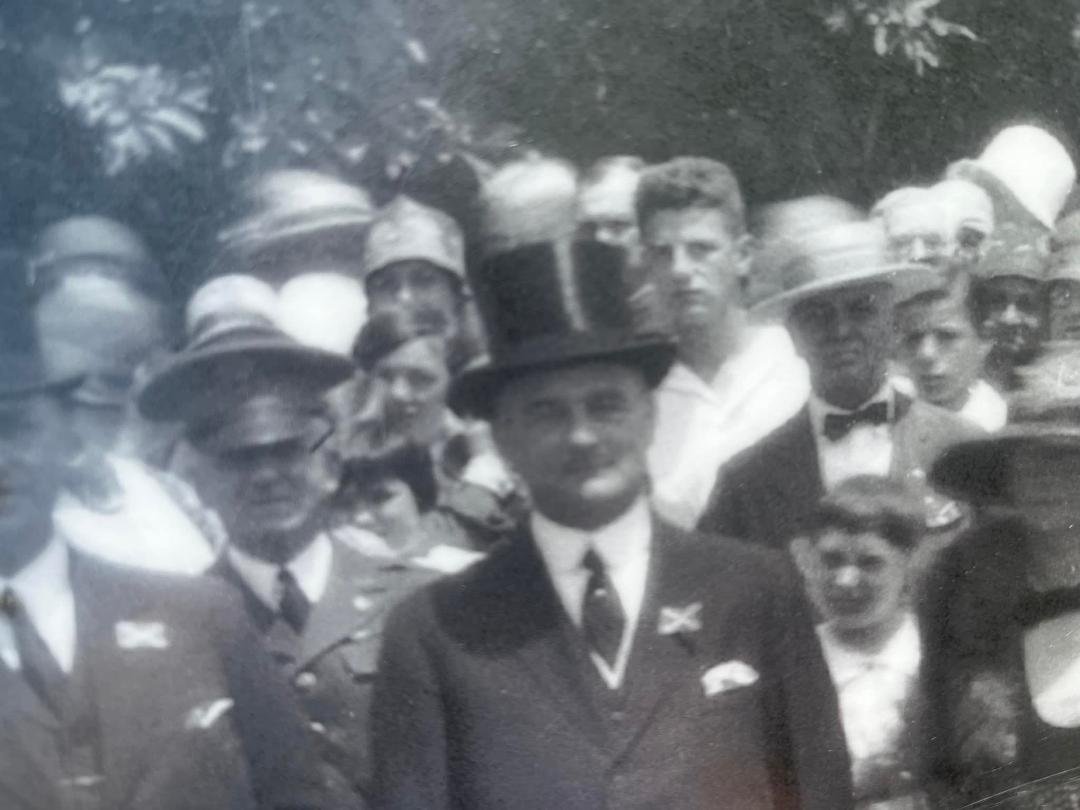 During our trip we were at the monument to North Carolina at Gettysburg. I was looking at the picture taken in 1929 and spotted something unusual. Look at the guy standing behind the guy in the top hat. Do you see anything