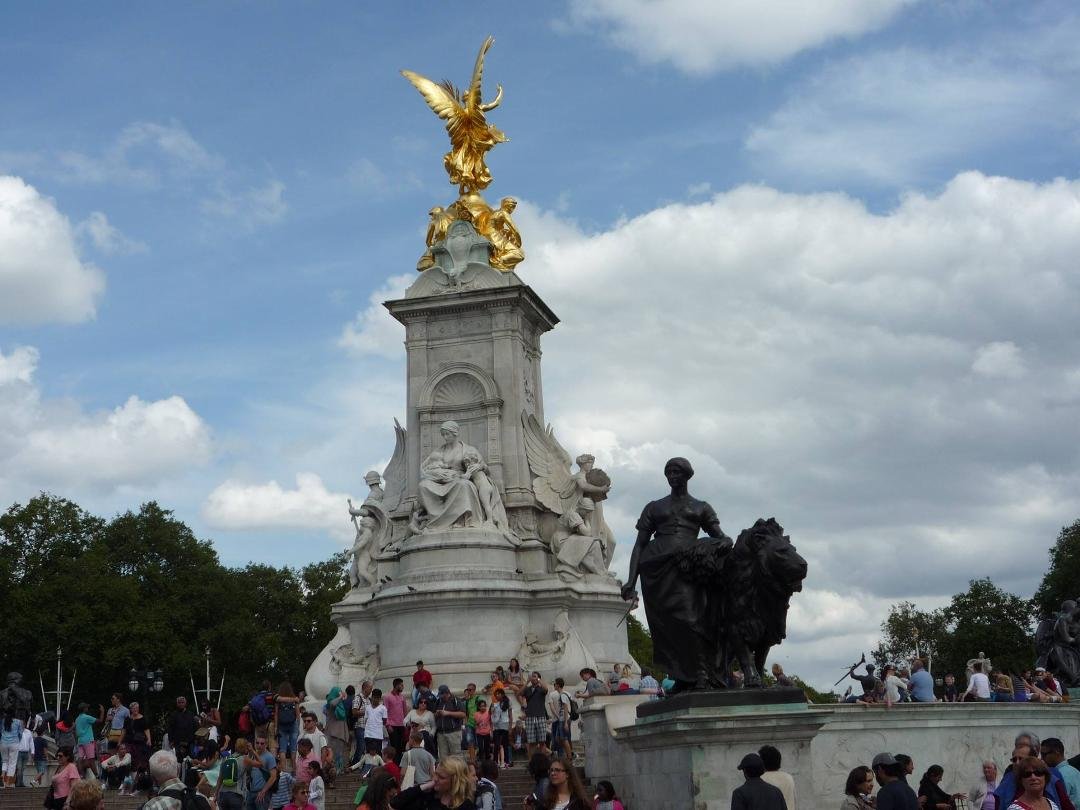 The Queen Victoria Memorial in the center of the street where Birdcage Rd and the Mall meet right in front of the Palace