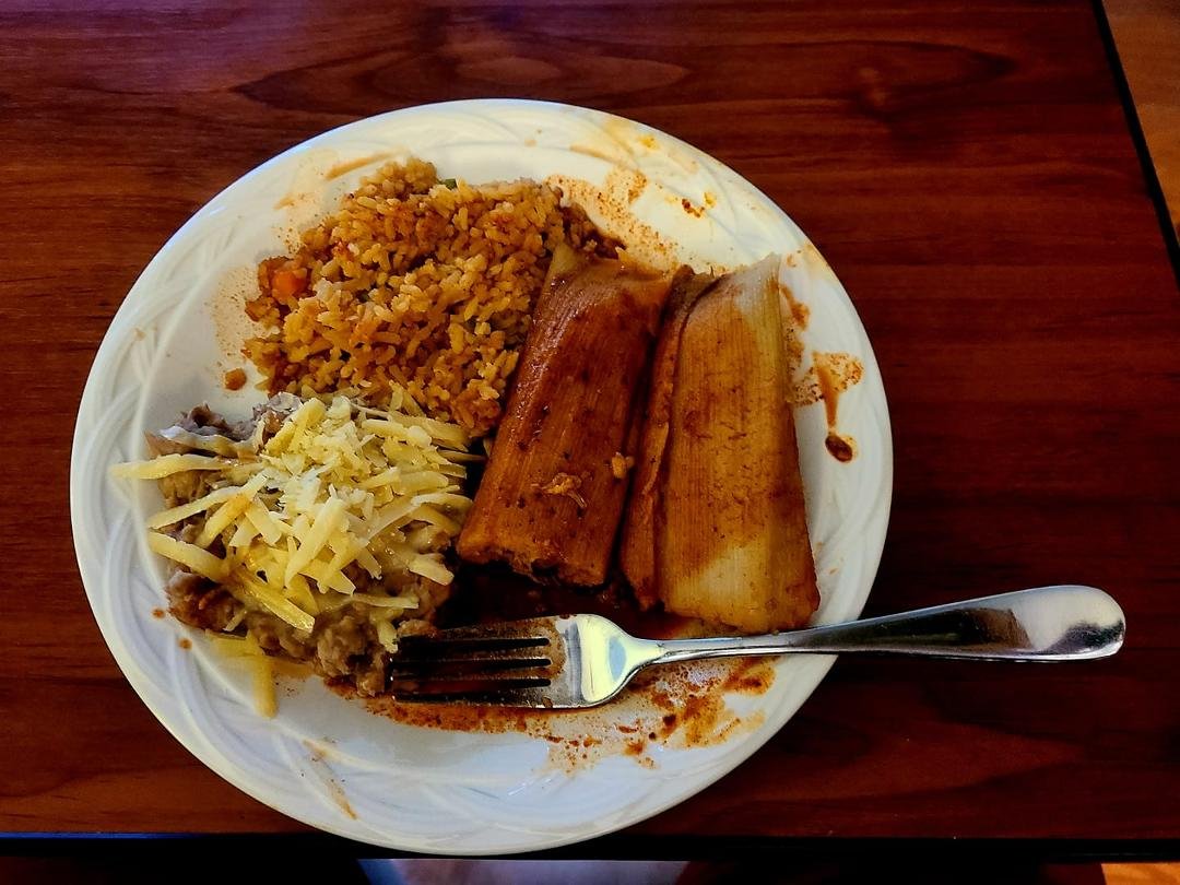 All homemade. Tamales, Refried Beans and Mexican Rice.