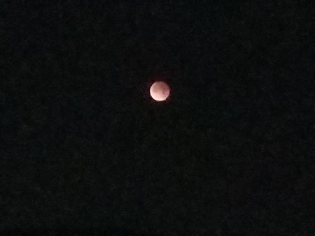 The Blood moon transitioning out of the eclipse