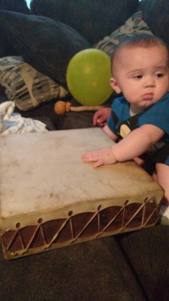 Teaching Grandson Taylor too play drum early