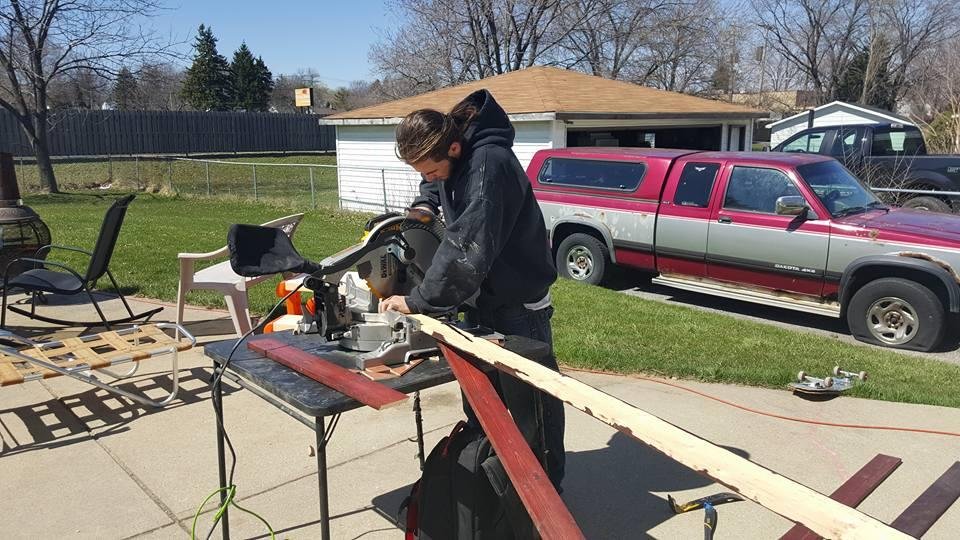 My grandson Shea doing home repairs at my house.
