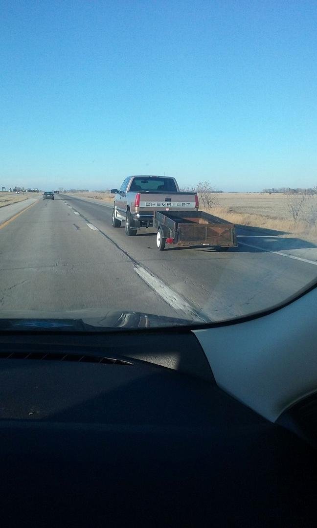 well I came upon this Chevy doing maybe 55 mph. must of been to much weight in the trailer glad I'm driving my Ford Tim Ronk