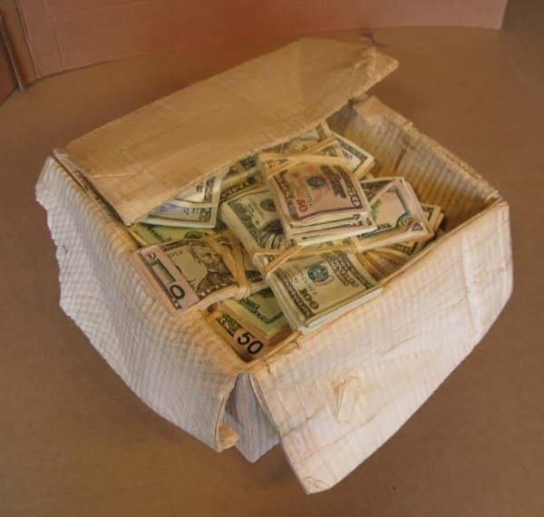 Went to the Brunk's Auction and bought a bunch of boxes of stuff. When I got home I opened one of the boxes and found it was full of cash. We still can't believe our luck. Just unbelievable. What a windfall.