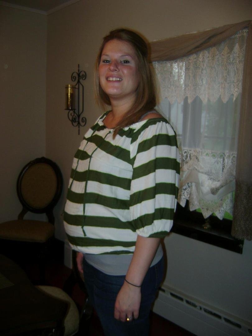 She is SUPPOSED to have that belly...lol.. Happy first Mother's Day... Max will be here next year!